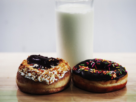 Bakery and milk .
Homemade bakery and butter with powdered sugarの写真素材