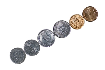 Closeup of  a row of Indian Coins, placed diagonally, 5 rupees, 2 rupees, 1 rupee, isolated on white background, copy space,の写真素材