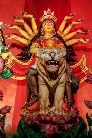 Durga Puja is the biggest festival in Bengal  This idol has no copyright owner and made only for the purpose of 5 days of worship after which Durga Idol on lion, traditional, worship, Hindu, Hinduism, Bengal culture, extravagant, earthen, colorful, travelのeditorial素材