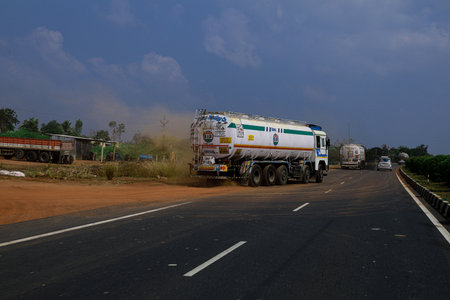 A fuel tanker getting on the national highwayのeditorial素材