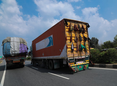 A logistics vehicle on highway trying to overtakeのeditorial素材