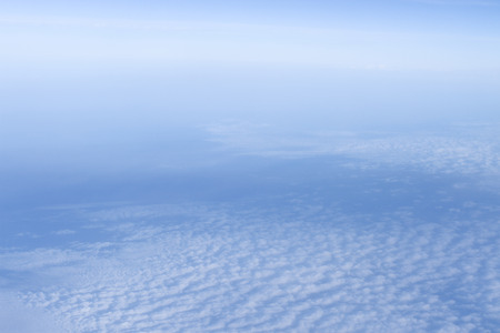 Photos from the plane through the window of an airplane.