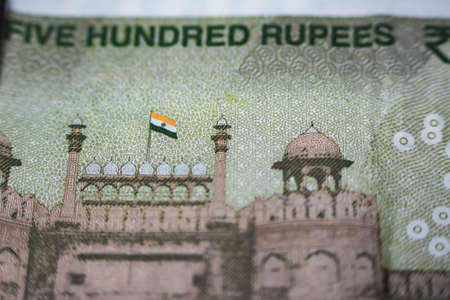 Closeup of Indian new 500 rupee note with backside of heritage red fort delhi india..