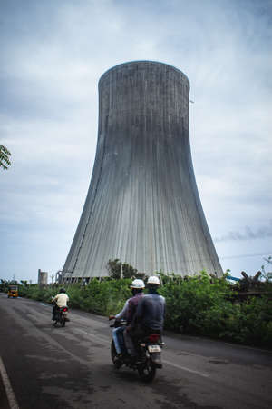 Ennore, Chennai, India: Oct 11th 2020: Industrial landscape - Smoke from the pipes of heat station with carry out harmful emissions.Petrochemical factory chimney.Its held to increasing Global warming.のeditorial素材