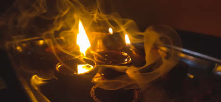 Indian oil lamps of lighting on Temple at Diwali Night. Diwali Oil lamps Festival .