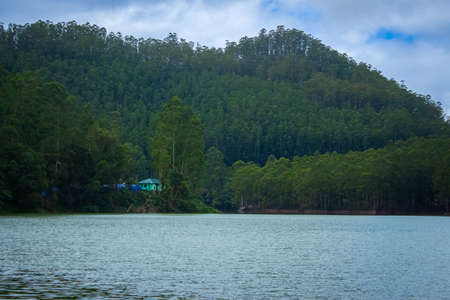 Beautiful Lake view landscape over the foggy mountain background. Landscape Stock Images.