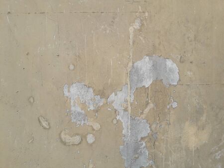Paint peeling plaster walls because of its use for a long time. Alternatively, use quality color to paint the walls. Must be repaired in order to come back again.の写真素材