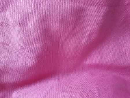 pink silk surface Looks elegant, used for making a craft background.の写真素材