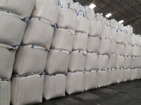 Chemical fertilizer Urea Stockpile jumbo-bag in warehouse waiting for shipment.の写真素材