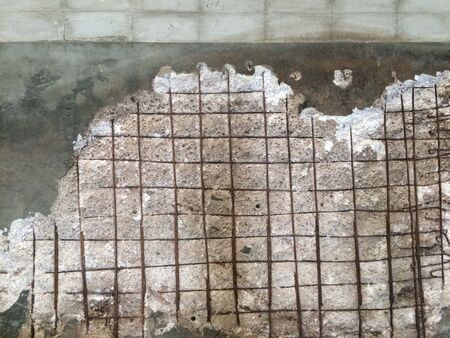 Gray cement wall Broken wall Due to lack of standards causing cracksの写真素材