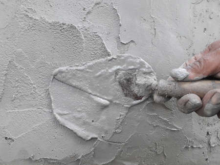 Gray cement wall Broken wall Due to lack of standards causing cracksの写真素材