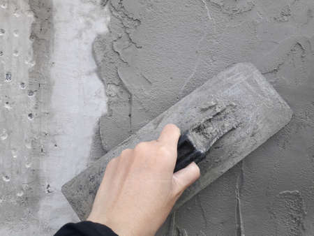 Gray cement wall Broken wall Due to lack of standards causing cracksの写真素材
