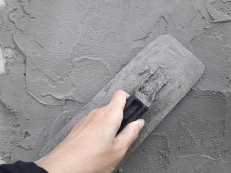 Gray cement wall Broken wall Due to lack of standards causing cracksの写真素材