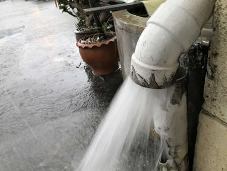 Old sewer damaged heavy rain lots of flowing water.