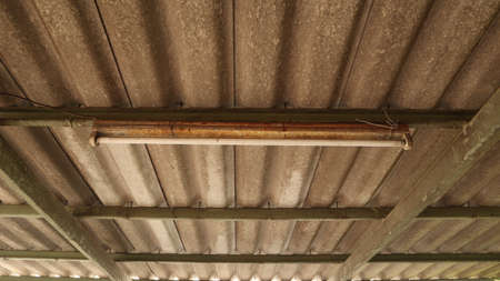 back structure Made from tiles light bulb long
with old not safe to use.