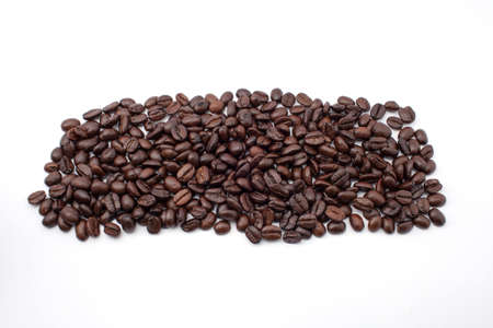 Coffee beans background isolated on whiteの写真素材
