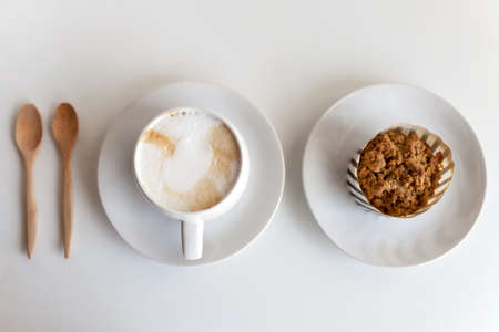 a cup of coffee on a white deskの写真素材