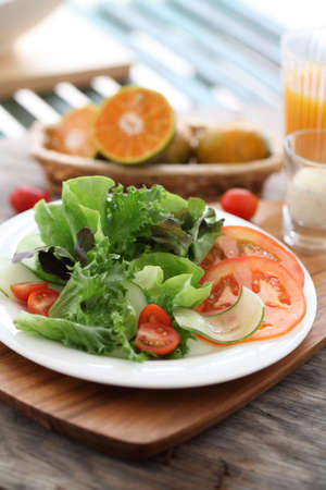 Delicious vegetable salad with olivesの写真素材