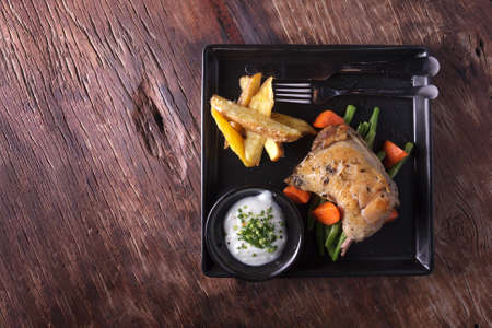 Chicken Leg Homemade Potato Wedgedの写真素材