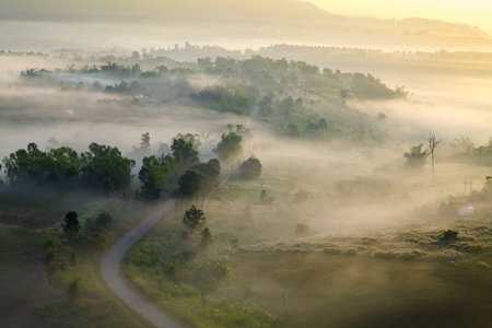 misty morning sunrise and road in mountain at Khao-kho Phetchabun,Thailandの写真素材