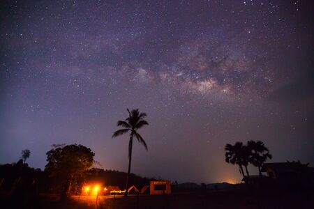 Silhouette of Tree with cloud and Milky Way. Long exposure photograph.の写真素材