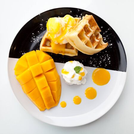waffles with ice cream and mangoの写真素材