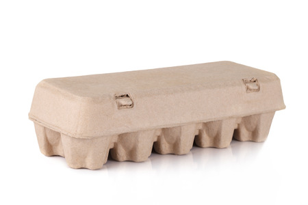eggs in an egg carton on a white background