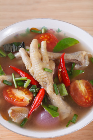 sour and spicy chicken feet soupの写真素材