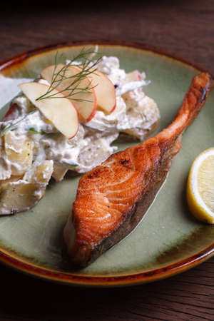 salmon steak with fruit salad