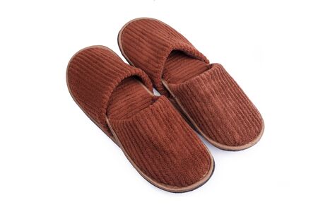 Brown wool slipper isolated on white backgroundの写真素材