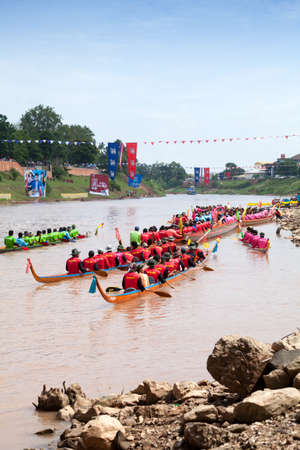 PHITSANULOK, THAILAND - SEP 19 : Unidentified crew in traditional Thai long boats competition...