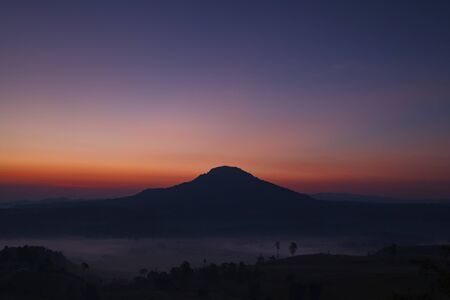 Misty morning sunrise in Khao Takhian Ngo View Point at Khao-kho Phetchabun,Thailandの写真素材