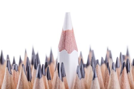 One sharpened white pencil among many onesの写真素材