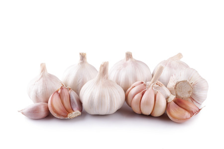 Fresh garlic isolated on white backgroundの写真素材