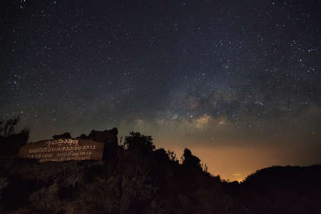 Doi Luang Chiang Dao, Chiang Mai - Febuary 13, 2016 : Milky Way Galaxy at Doi Luang Chiang Dao with Thai Language top point signs.の写真素材