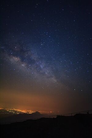 Milky way galaxy at Phutabberk Phetchabun in Thailand.Long exposure photograph.With grain