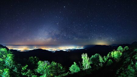 Starry night sky at Monson viewpoint Doi AngKhang and milky way galaxy with stars and space dust in...