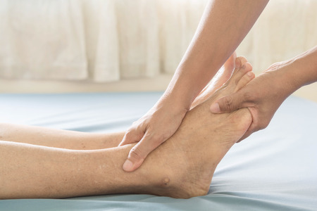 Foot Massage  old womenの写真素材