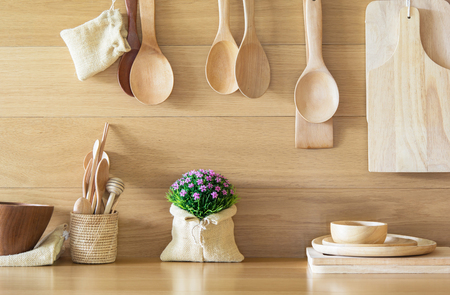 Lovely plastic flower bouquet in the wood kitchen.の写真素材