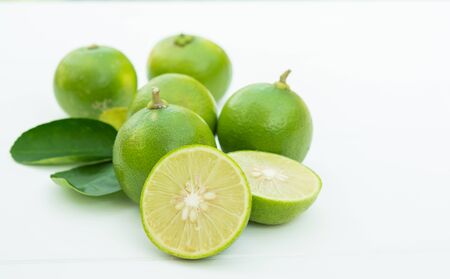 Fresh green lime and white top leavesの写真素材