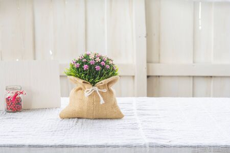 Plastic flower bouquet in a sack bagの写真素材