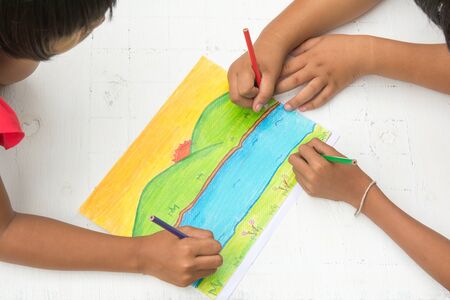 thai kids   with crayonsの写真素材