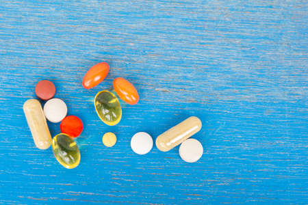 Drug on old wood tableの写真素材