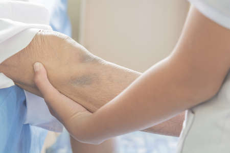 Knee pain in older people background.の写真素材