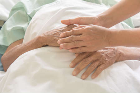 hospital patient hands to careの写真素材