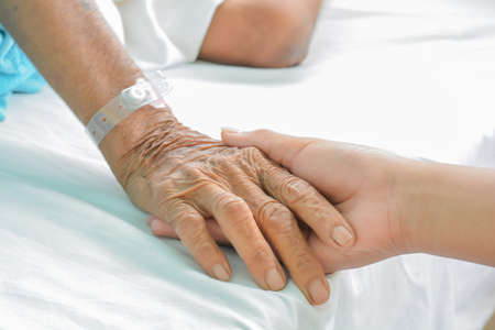 hospital patient hands to care