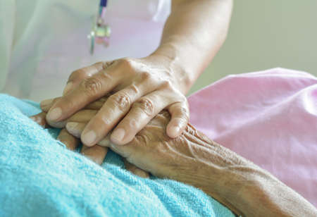 hospital patient hands to care