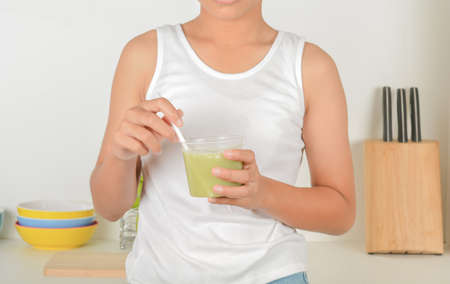 Teenagers with apple juiceの写真素材