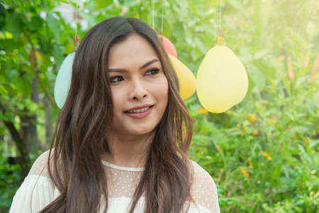 Beautiful woman in the garden in the morning and sunshine New life normally in the house