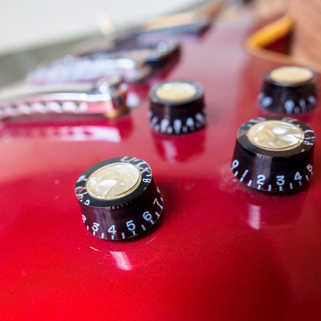 Close up of electric guitar volume knobの写真素材